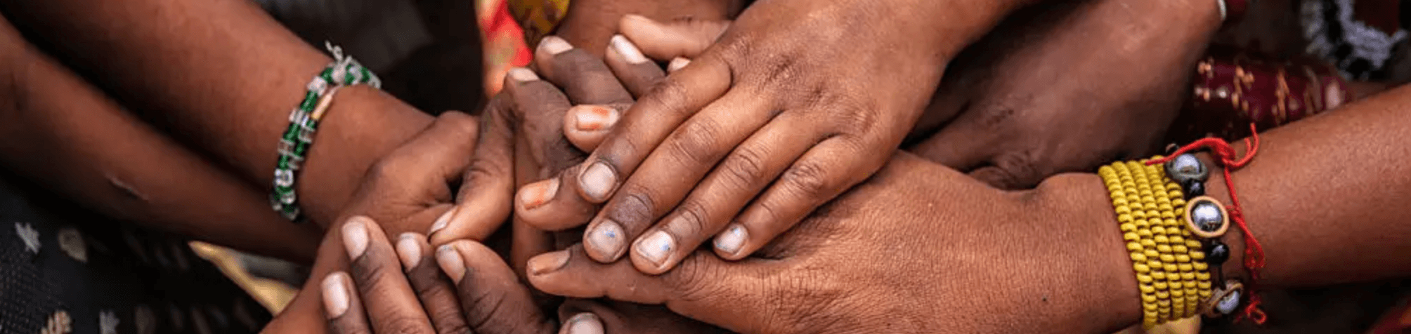 Community hands together - Unity and support